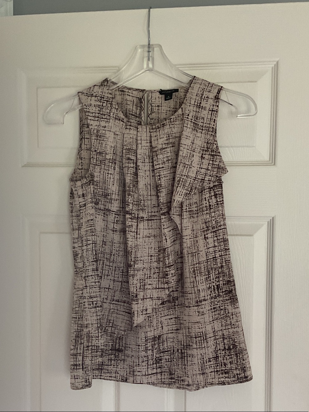 Sleeveless Ruffle Front Blouse - Neutral Tones